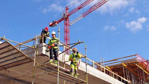 Construction workers in Warsaw, Poland