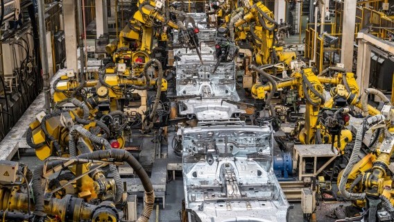 Robotic arms operate in a welding hall of the Suzuki manufacturing plant in Hungary Source: