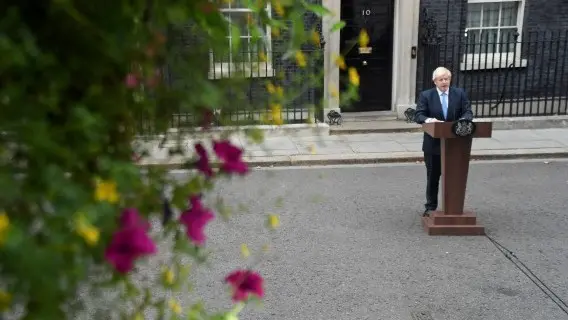 Britain's Prime Minister Boris Johnson speaks outside 10 Downing Street in London.