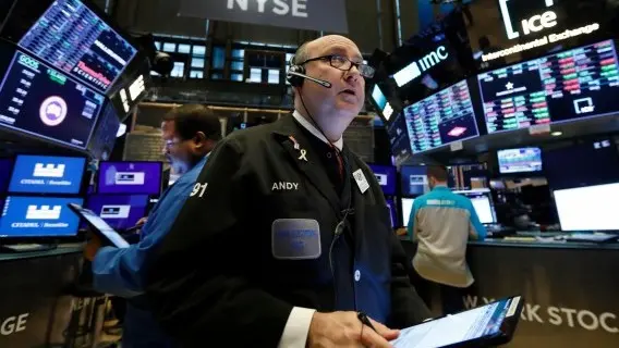 A trader working on the floor of the New York Stock Exchange.