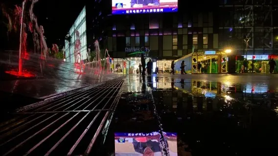 China's President, Xi Jinping, on a big screen in a Beijing shopping centre