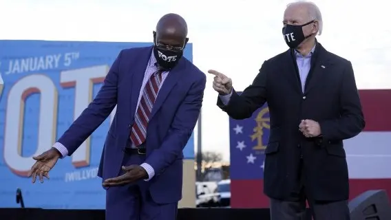 Democratic Senator-elect Raphael Warnock with President-elect Joe Biden in Atlanta earlier this year