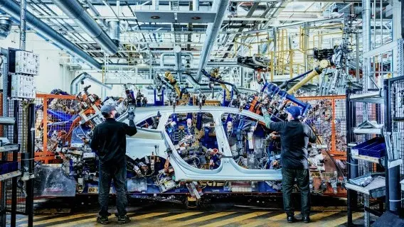 Workers in a car factory