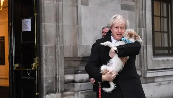 Boris Johnson voting earlier with his dog, Dilyn
