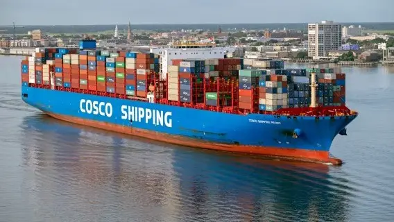 A 366-meter container vessel owned by Chinese state-owned shipping company COSCO, heading into Charleston Harbour in the US