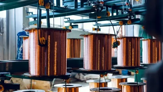 Copper wire reels at a cable factory