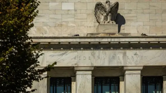 It's a close call whether the Fed will hike rates this year. We think the central bank will hold rates steady for an extended period