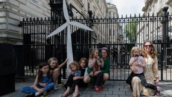 Children protesting for greener environmental policies pictured outside Downing Street in London in 2020