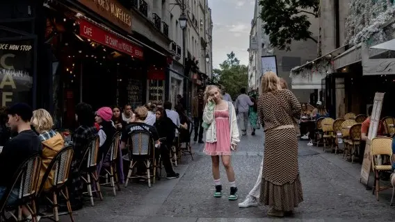 A cool woman on her phone in Paris