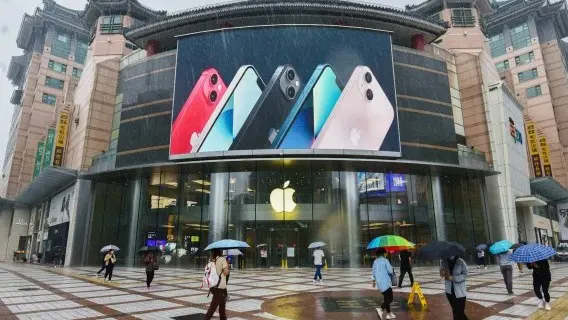 Chips for many electronic goods have been in short supply. Pictured, an Apple store in Beijing