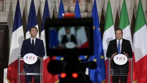 French President Emmanuel Macron, left, and Italian Premier Mario Draghi