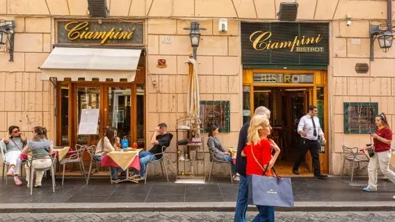 People enjoy the May Rome sunshine