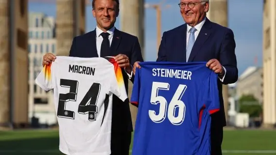 France's Emmanuel Macron and the German President, Frank-Walter Steinmeier, before the start of the Euros.