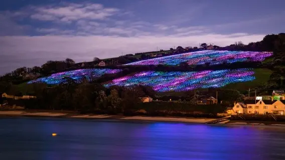 20,000 lowlight, fibre-optic stemmed light bulbs make up the Field of Light art installation in Devon, UK
