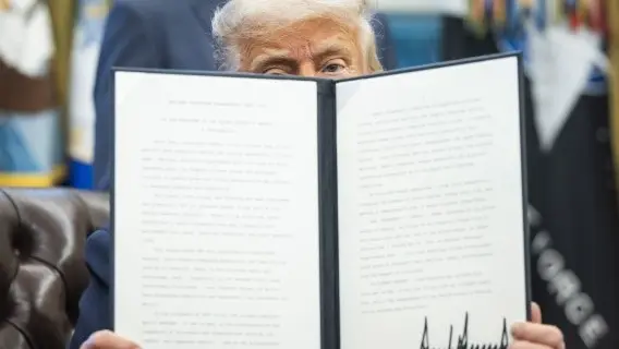 US President Donald Trump signing a series of executive orders in the Oval Office of the White House this week