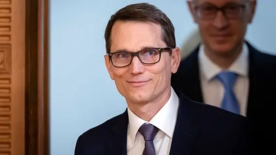 SNB Chairman Martin Schlegel arrives at a media briefing on 25 September 2025