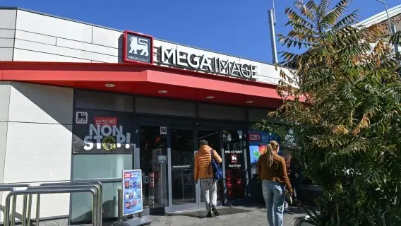 Shoppers at a supermarket in Bucharest
