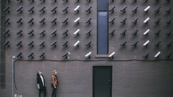 women-looking-at-security-cameras-on-wall2.jpg