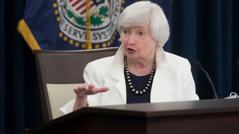 The Fed hikes and threatens more
