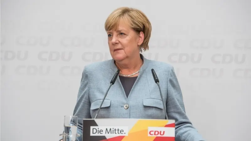 EUR whipped around by Merkel fears