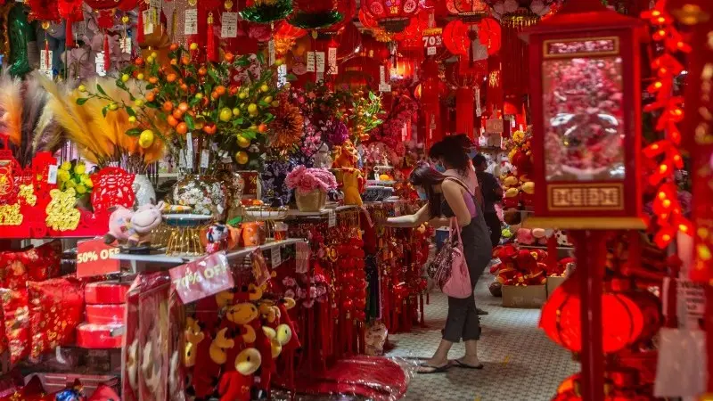 Chinese New Year travel restrictions means more spending