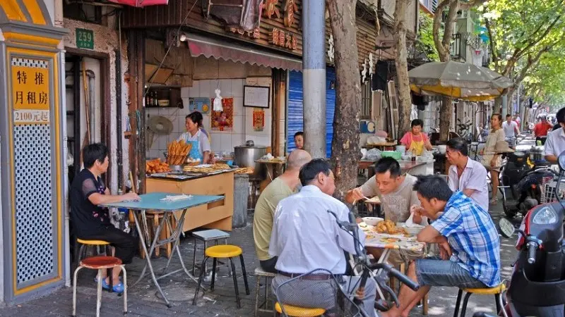China: Inflation dips below zero again on lower pork prices