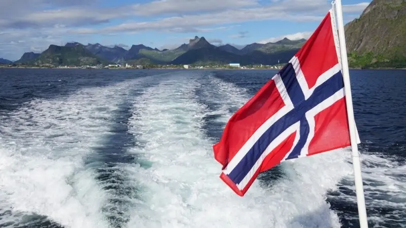 Norges Bank raises rates, but signals a more cautious stance