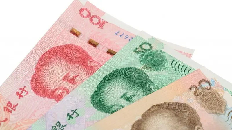 USD/CNY pushes above 7.0