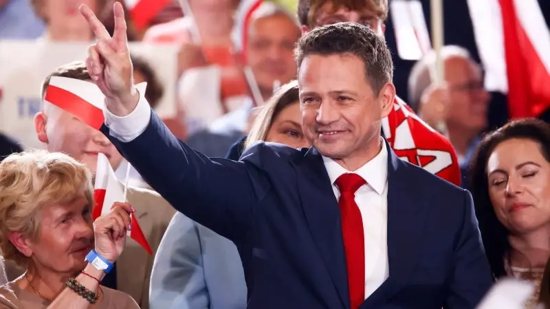 Poland's ruling party candidate edges ahead in tight presidential first round
