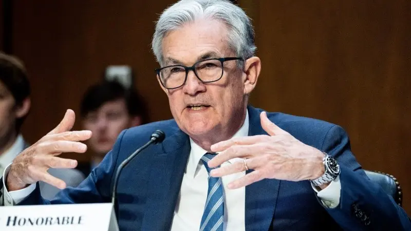 Fed's Powell signals a willingness to cut rates, but more progress is required