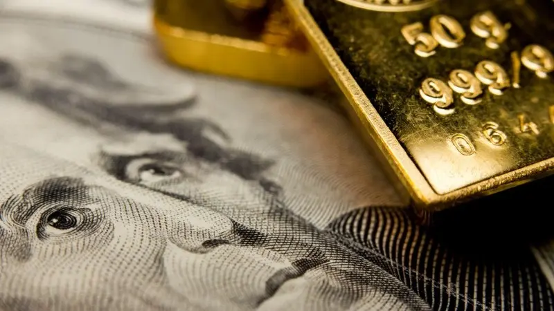 FX Daily: Is gold telling us something about the dollar?