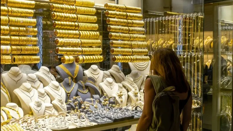 Gold gains after data fuels hopes of a Fed pause