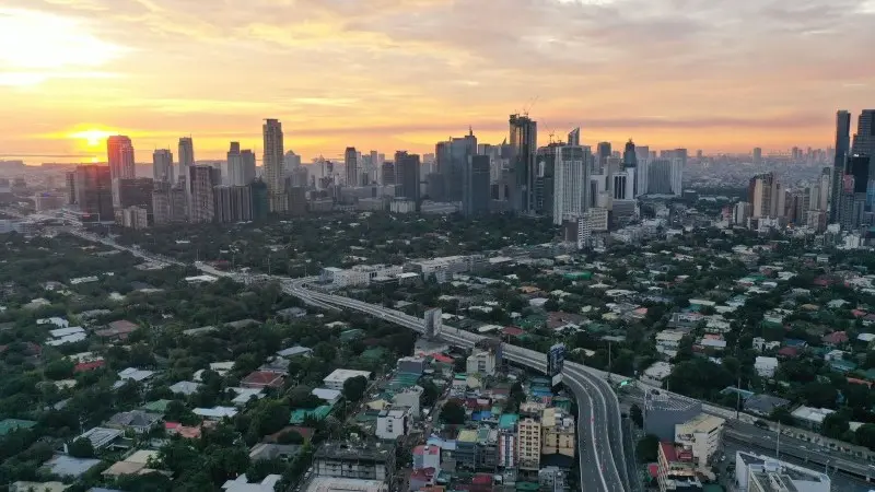 Philippine inflation eases, but rate hikes still likely