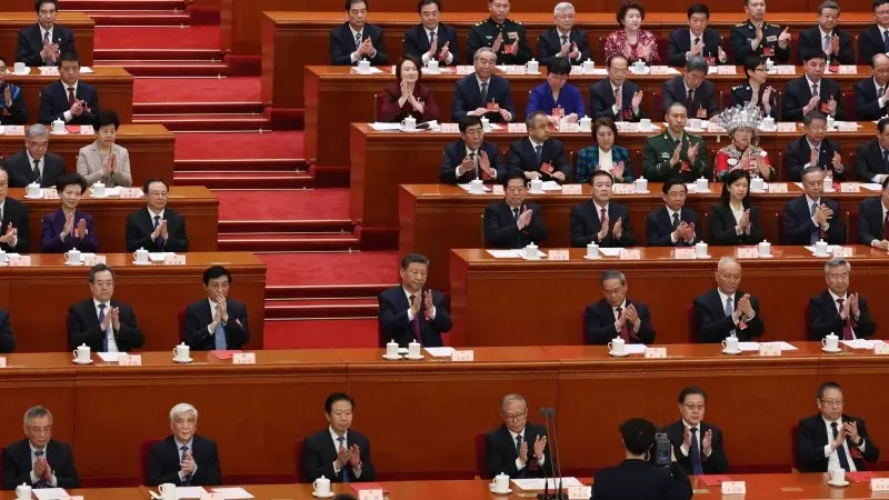 China lowers growth target as geopolitical risk complicates outlook