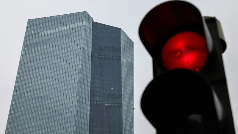 ECB keeps interest rates on hold, avoids rattling markets